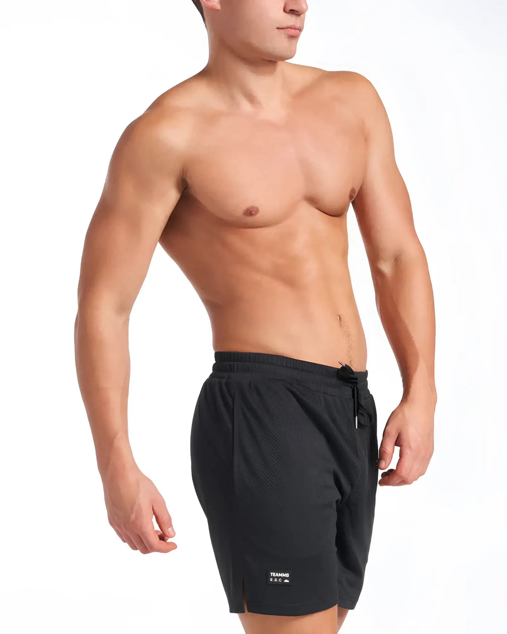 Black s.s.c. mesh 6 inch athletic shorts with drawstring waistband and small white logo on lower left leg
