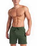 Dark green s.s.c. mesh 6 inch athletic shorts with drawstring waistband made of breathable mesh material