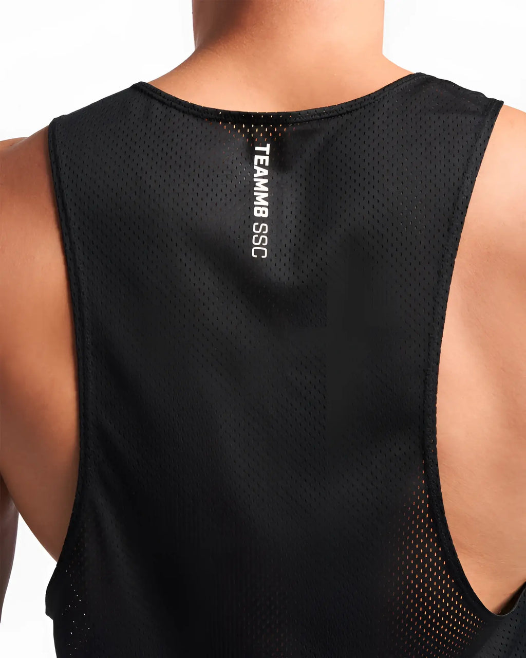 Black mesh athletic tank top with team8 ssc branding down the center back shown from the back side