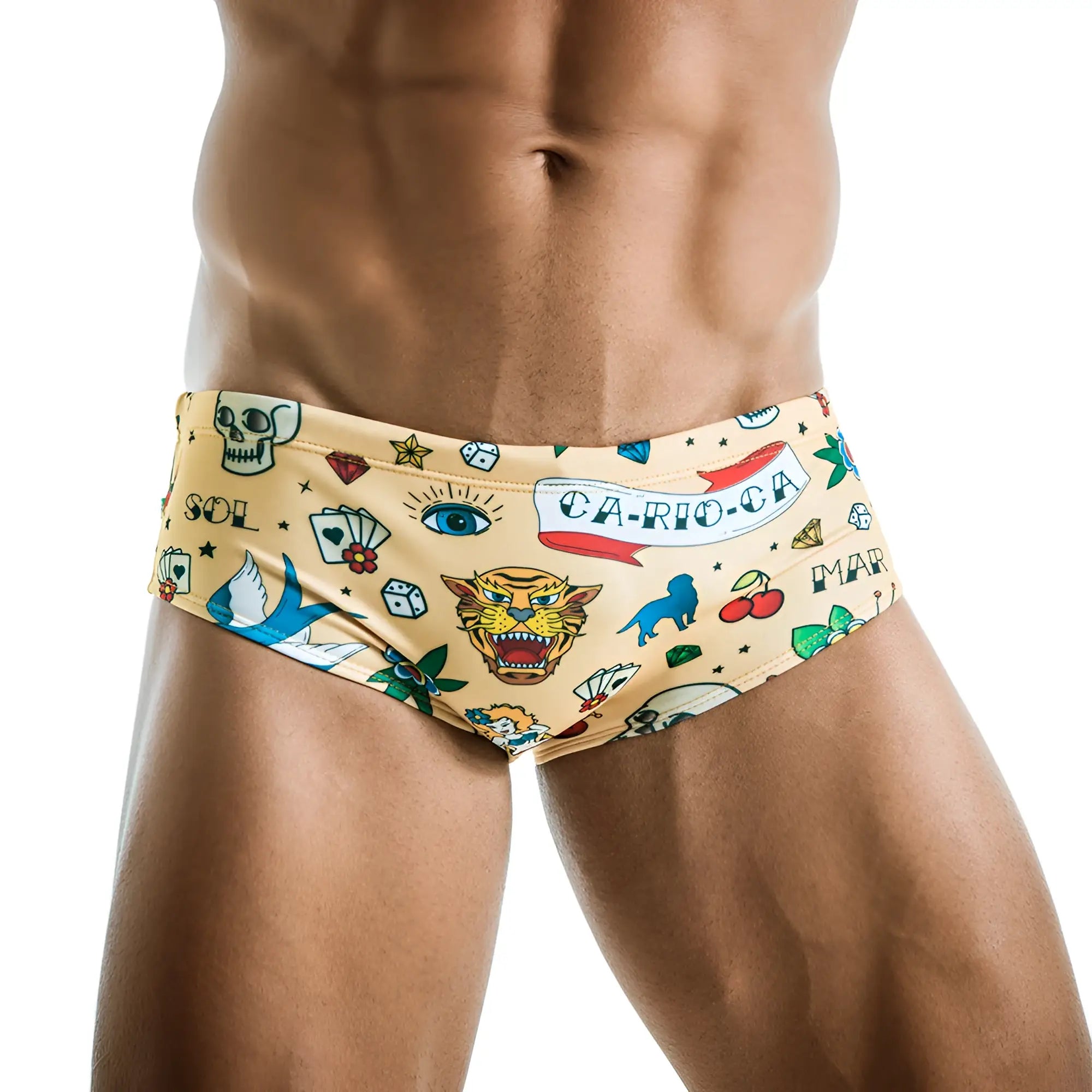 Beige men’s designer swim trunks featuring vibrant tattoo-style print with skulls dice eye and tiger for swimwear clearance