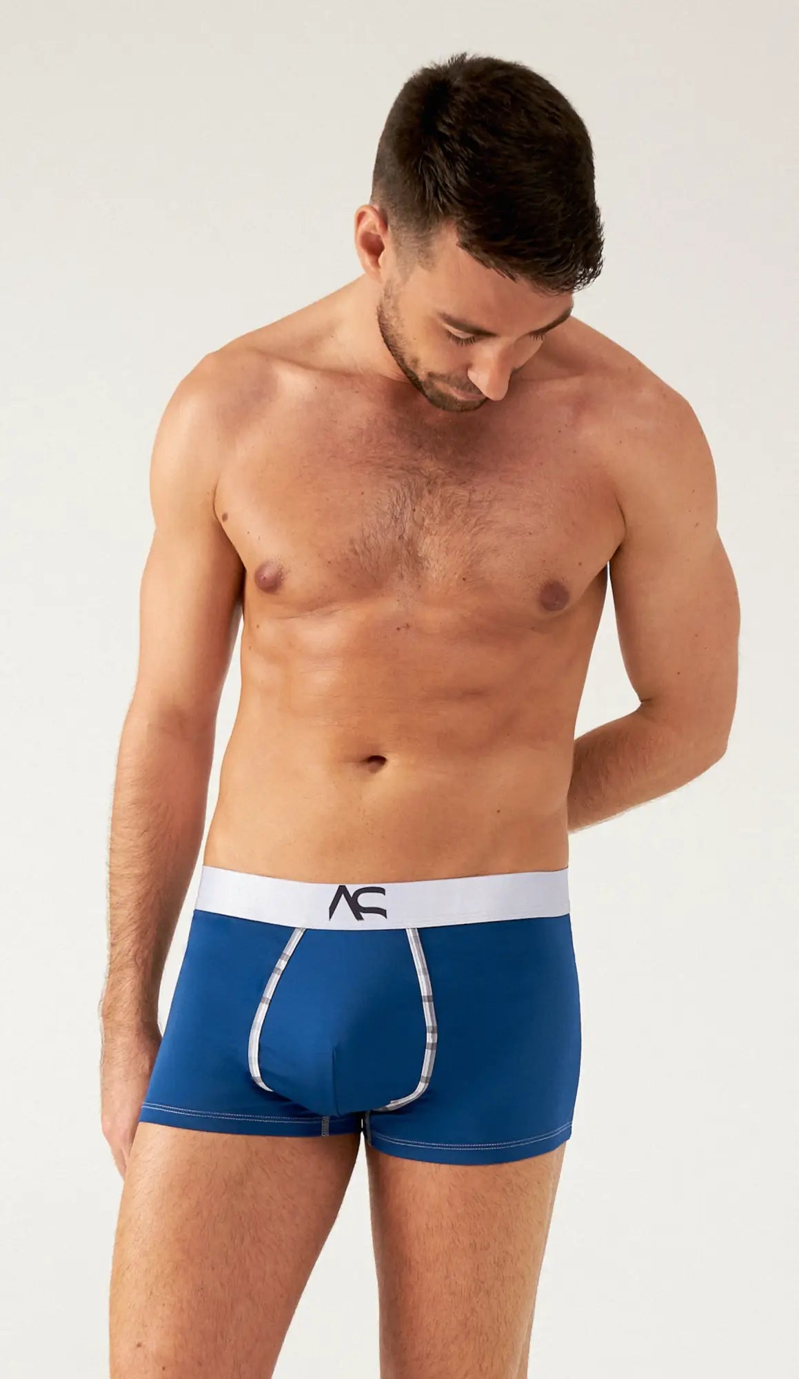 Saltire boxer briefs are blue men’s boxer briefs with a white ac logo waistband and silver stitching on leg openings