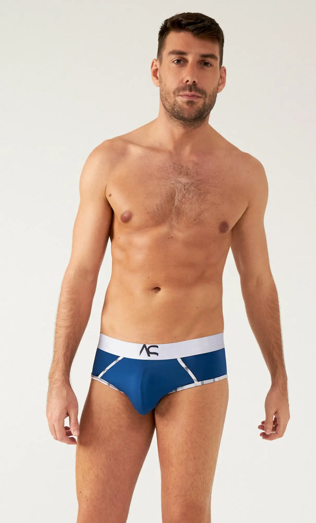 Blue saltire briefs with a white waistband featuring the ac logo made from soft breathable fabric for men