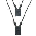 Black rectangular pendant scapular necklace with engraved cross and text on braided cord men’s jewelry
