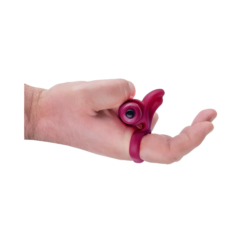 A vibrant magenta plastic You Turn two finger fun finger vibe with circular grip and ergonomic finger loops by Screaming O