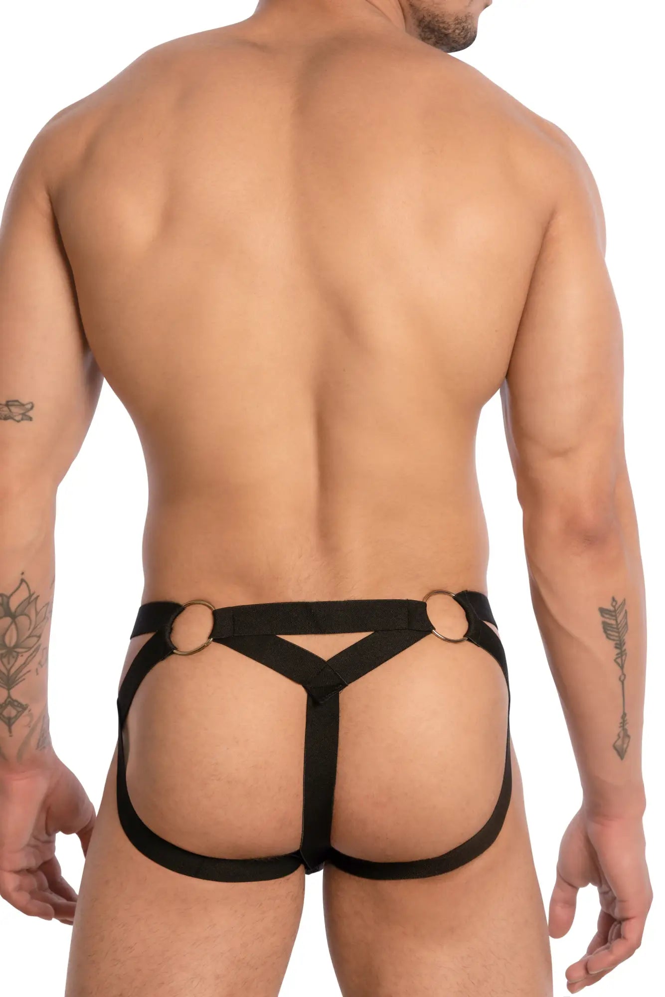 Black leather-like harness bikini with gold-toned circular rings at the waistband for men from secret male
