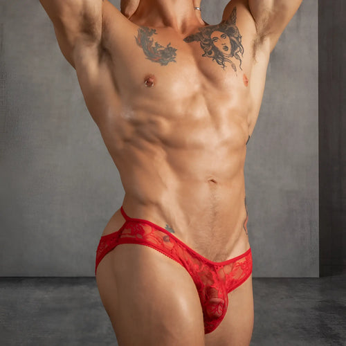 Red lace thong bikini brief with intricate floral pattern and sheer mesh detailing for secret male smi047 collection