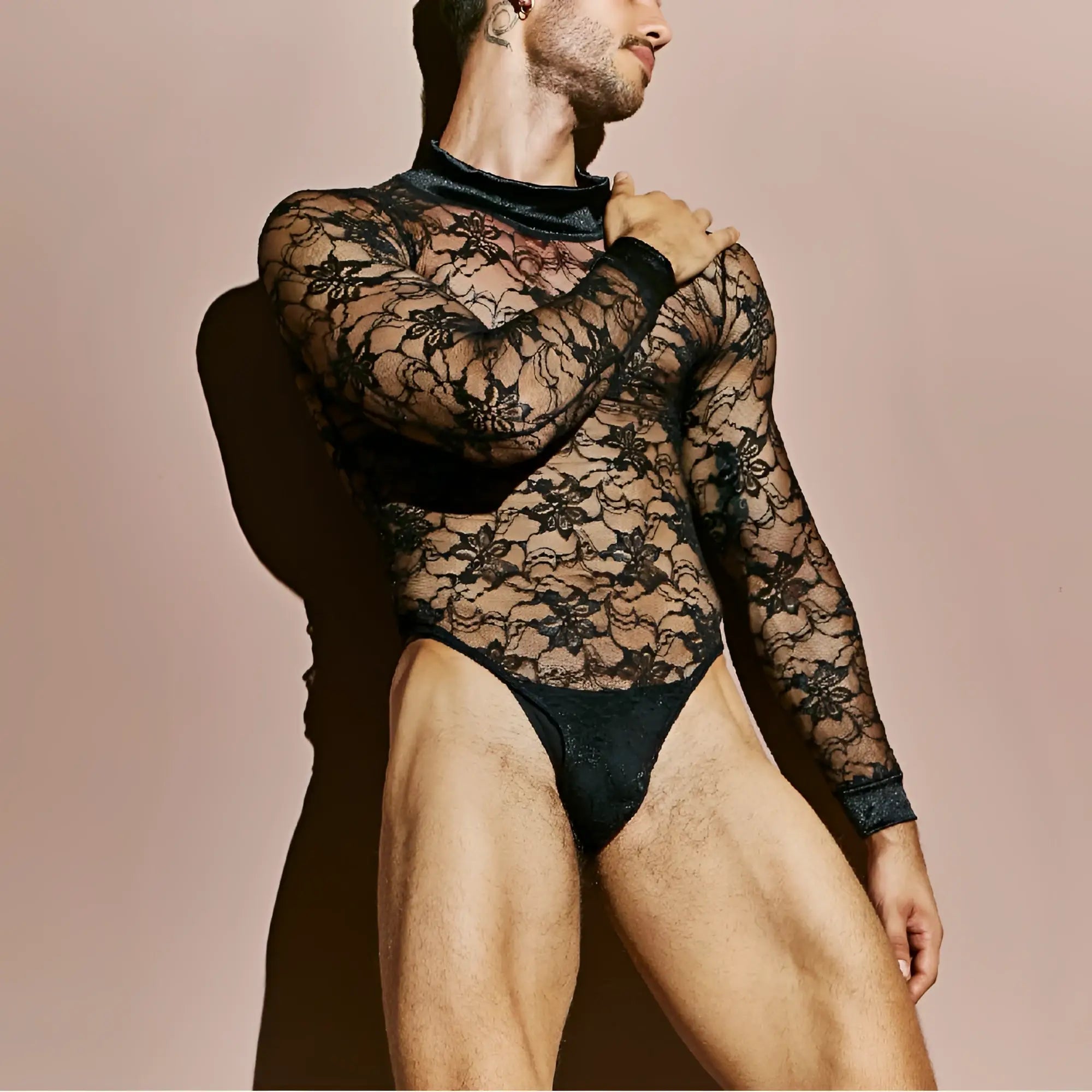 Secret Male SMV008 black lace bodysuit with long sleeves and high neckline detailed for elegant wear