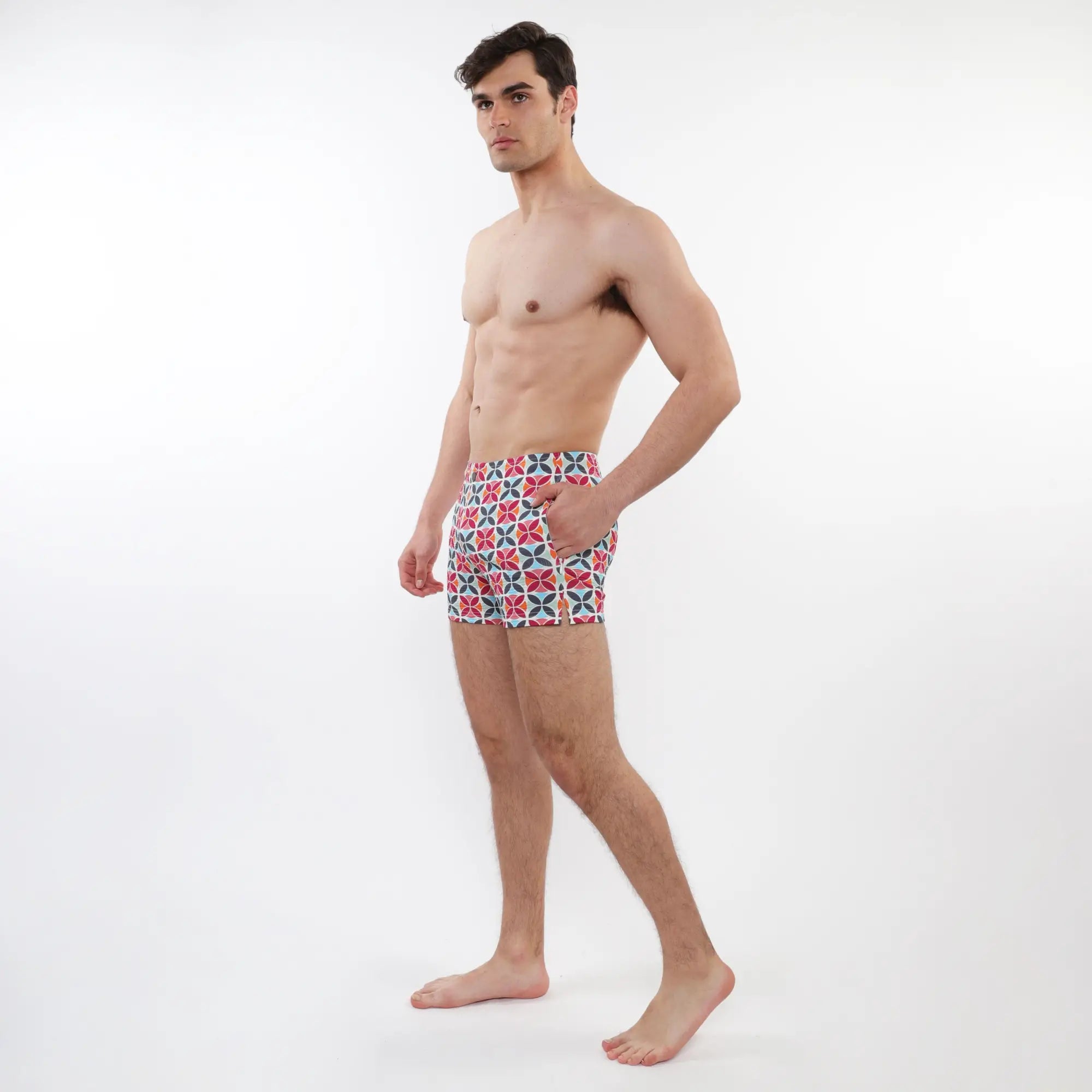 Mens red white and navy blue geometric patterned briefs with mesh lining for seersucker swim shorts use