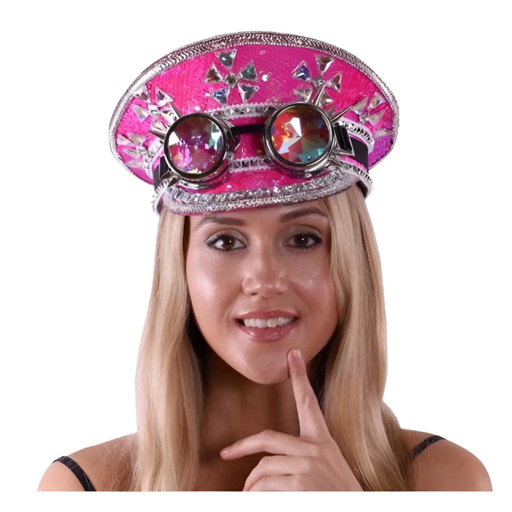 A vibrant pink glittery sequin festival hat with sparkling rhinestones and integrated steampunk goggles