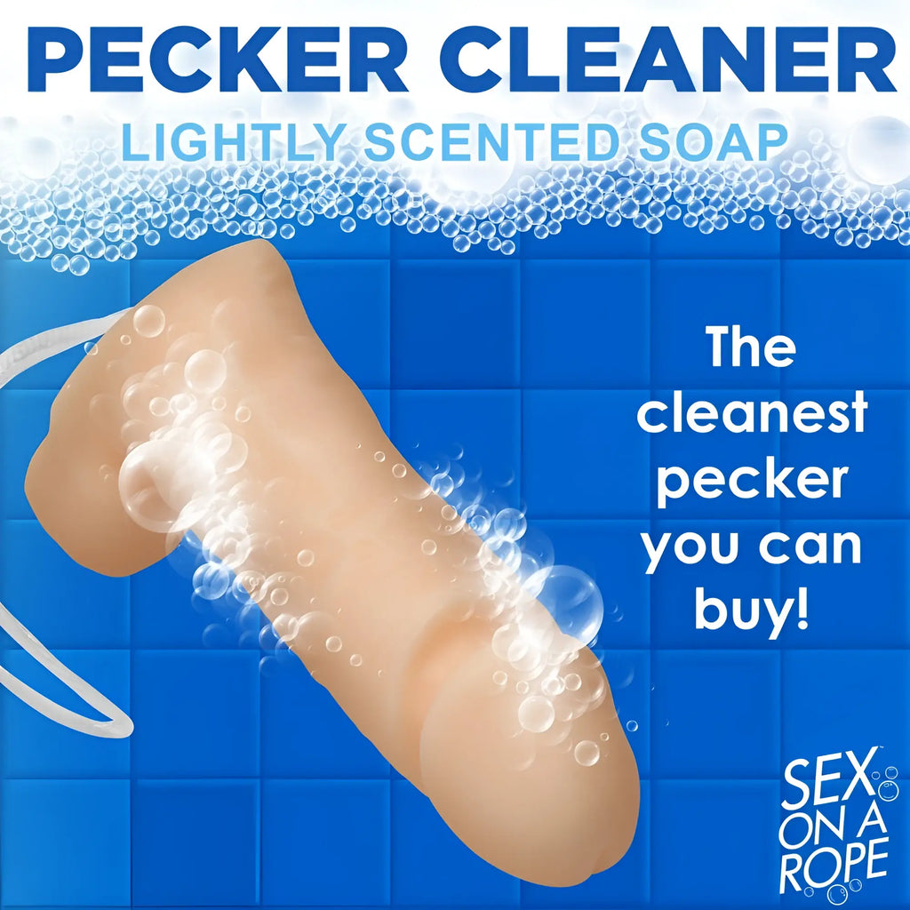 Sex on a Rope Pecker Soap: A beige, phallus-shaped bar of soap on a rope against a blue tiled background with bubbles.