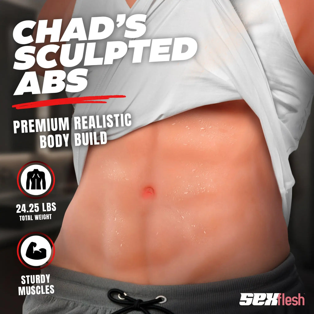 SexFlesh Chiseled Chad doll: Close-up of realistic male torso with defined abs, wearing a white shirt and grey shorts.