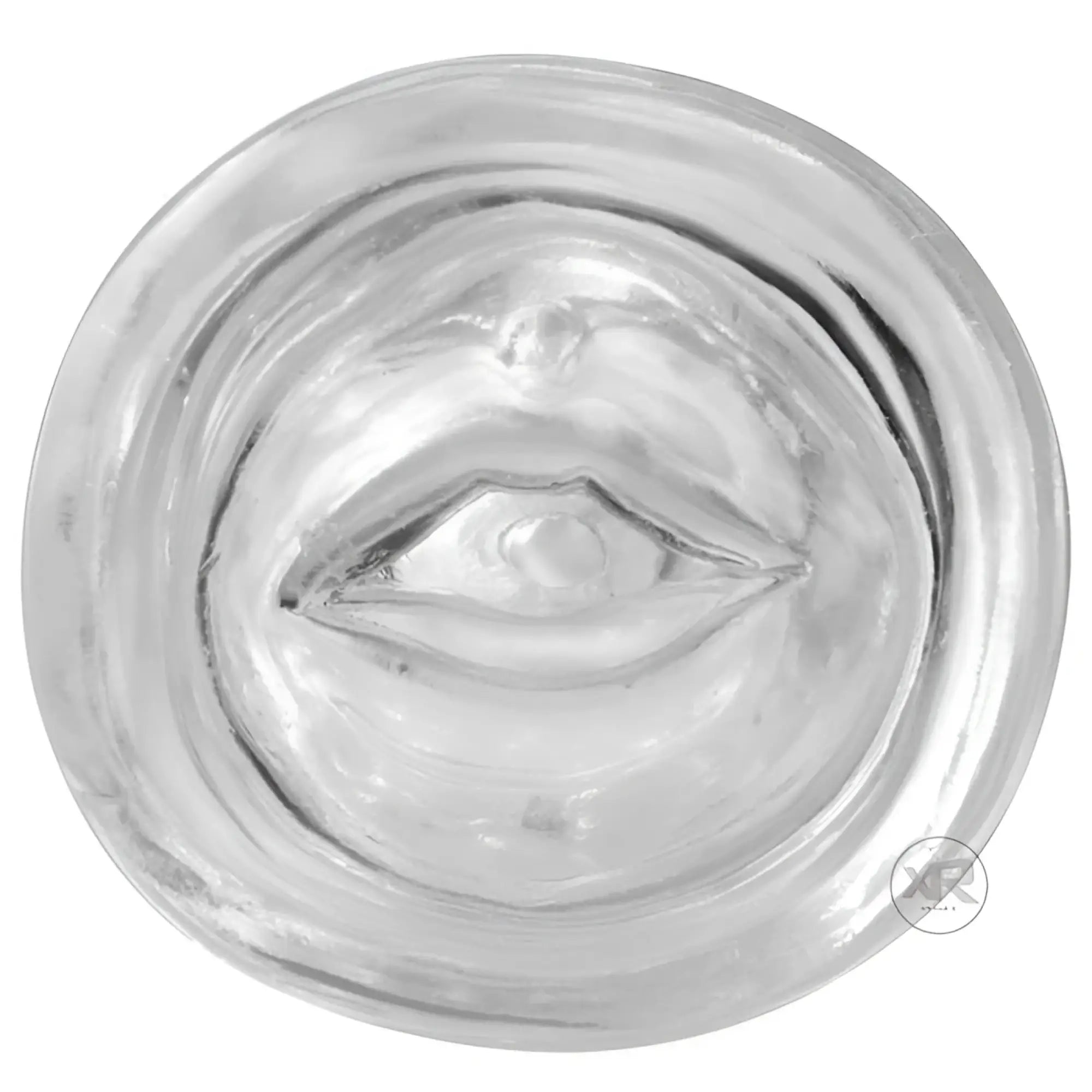 SexFlesh Lusty Lips see-through masturbator: a circular, clear silicone insert featuring a molded lip-shaped opening.