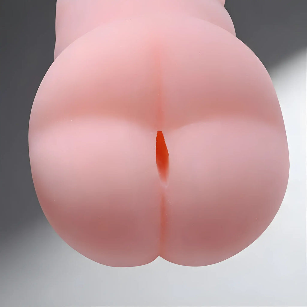 SexFlesh Moe’s Tight Ass masturbator: A peach-colored, realistic silicone textured butt-shaped male sex toy.