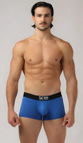 Blue men’s shaped pouch trunks boxer briefs with black elastic waistband and white logo for comfortable support