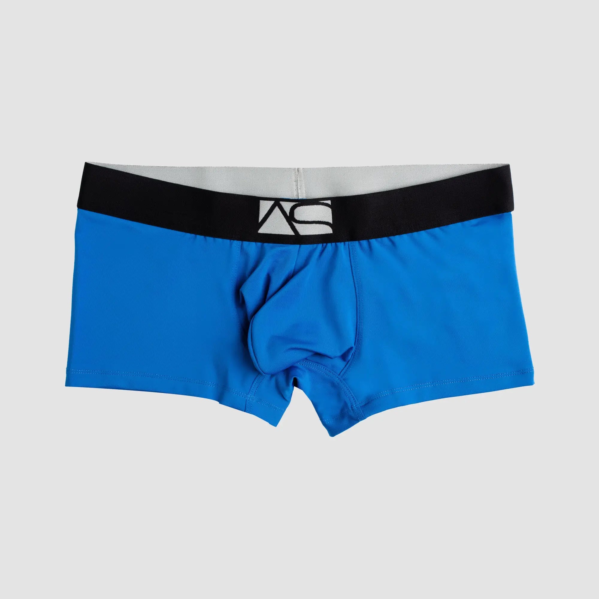 Bright blue shaped pouch trunks with black waistband and white logo designed for men’s supportive comfort underwear