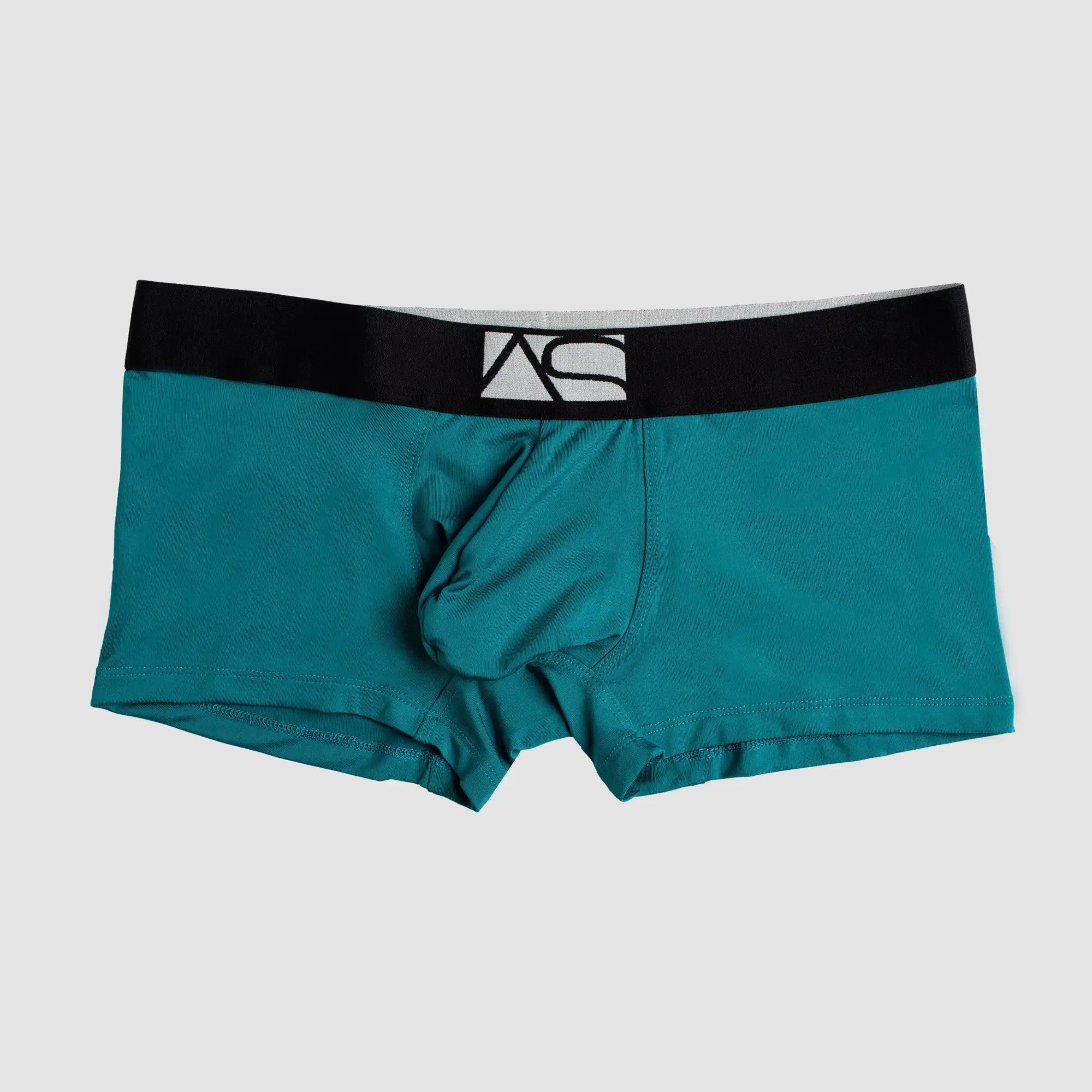 Teal shaped pouch trunks men’s briefs with a black waistband featuring a white logo for comfortable support
