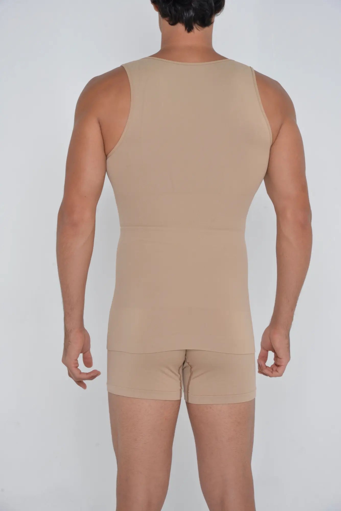 Beige seamless shaper tank sleeveless top with a flattering fit made of smooth stretchy fabric