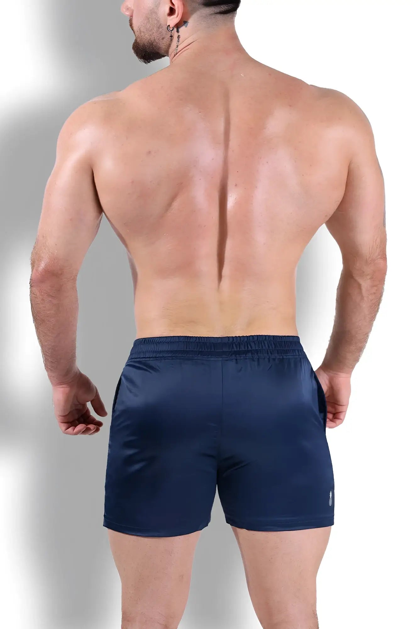 Navy shimmerflex active shorts with elastic waistband and small logo on lower right leg for athletic use