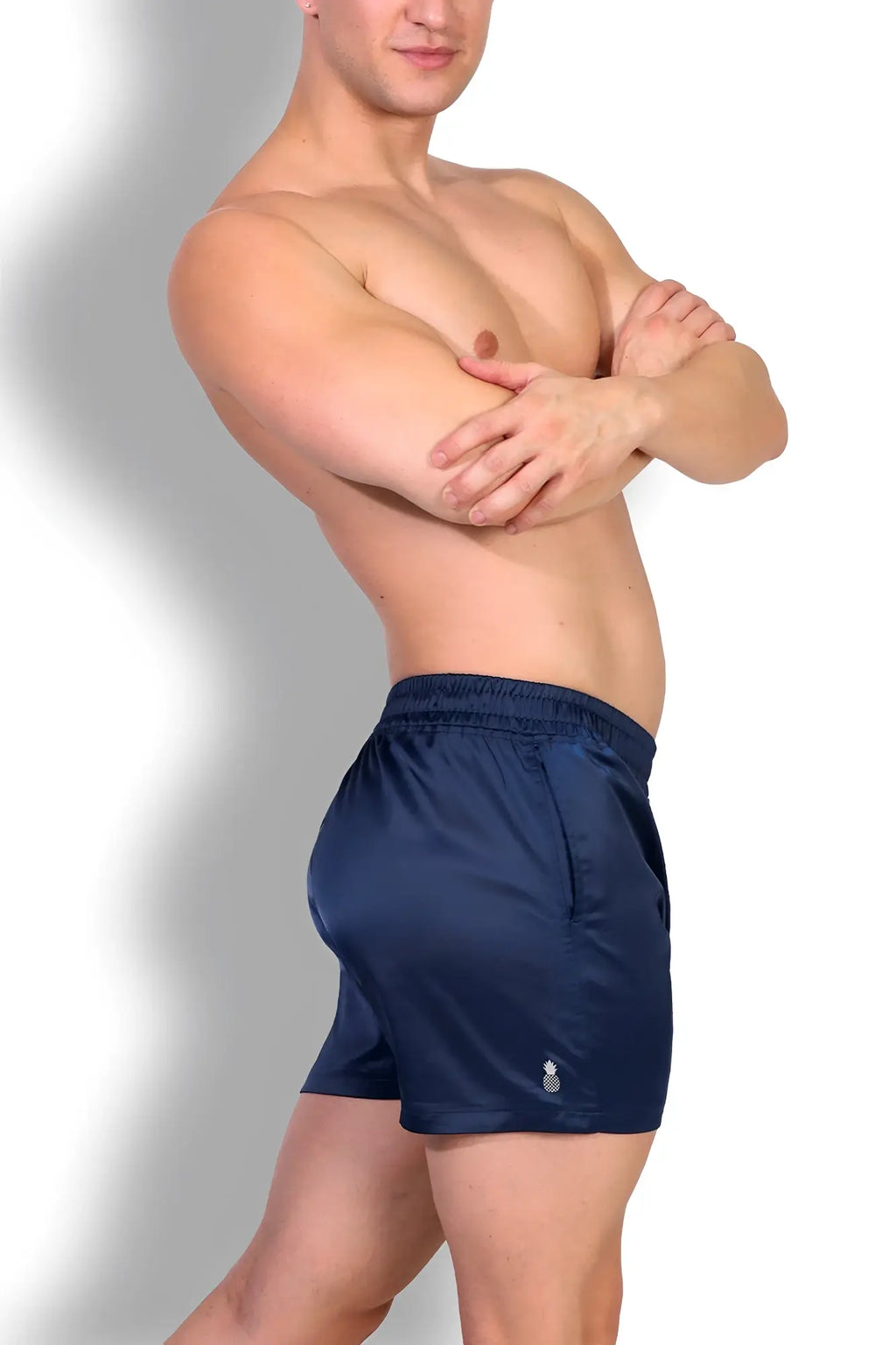 Navy shimmerflex active shorts with subtle sheen and elastic waistband designed for athletic use