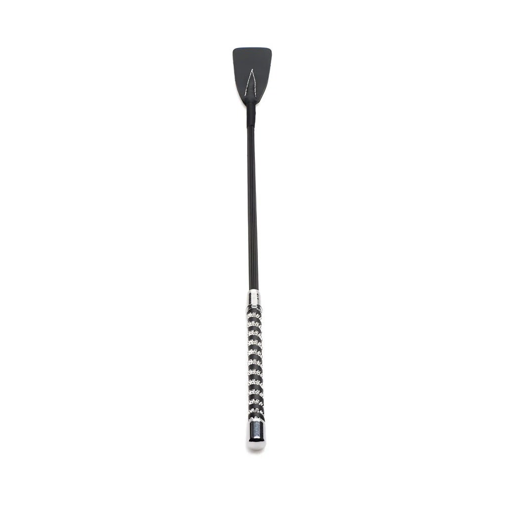 Short black leather riding crop with a silver-tipped handle featuring an intricate braided design and rhinestones