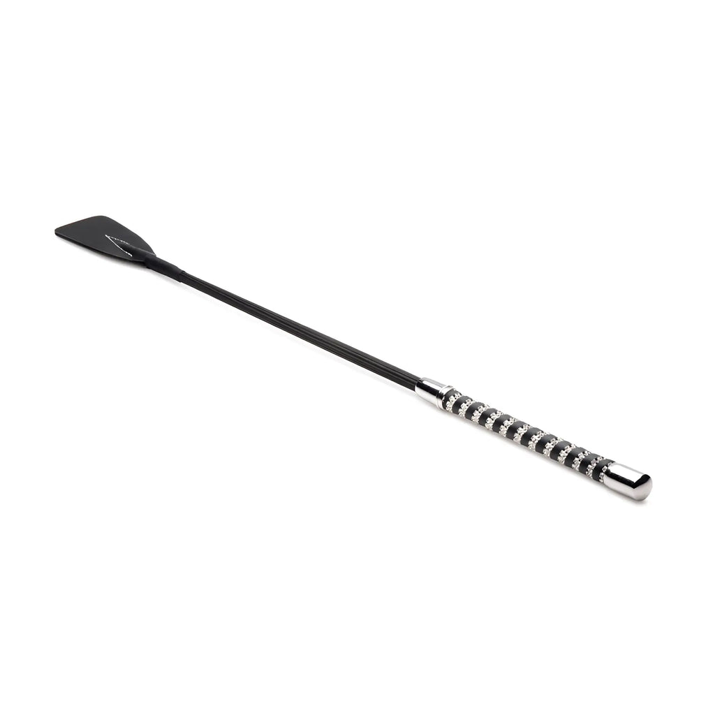 Short black leather riding crop with silver-tipped handle adorned with sparkling rhinestones for equestrian use