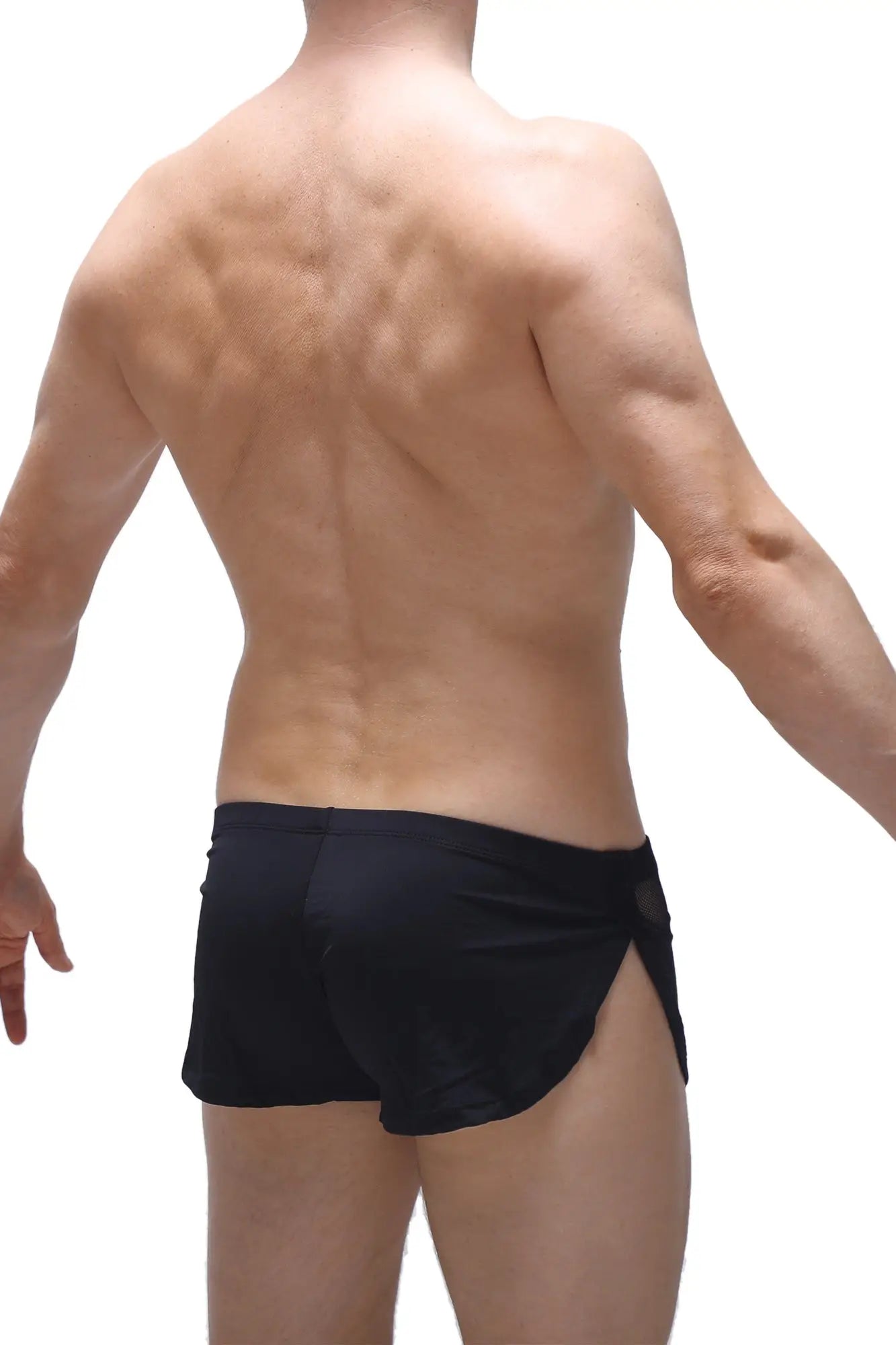 Black short lounge athletic shorts with sleek form-fitting design and side slits for comfortable movement