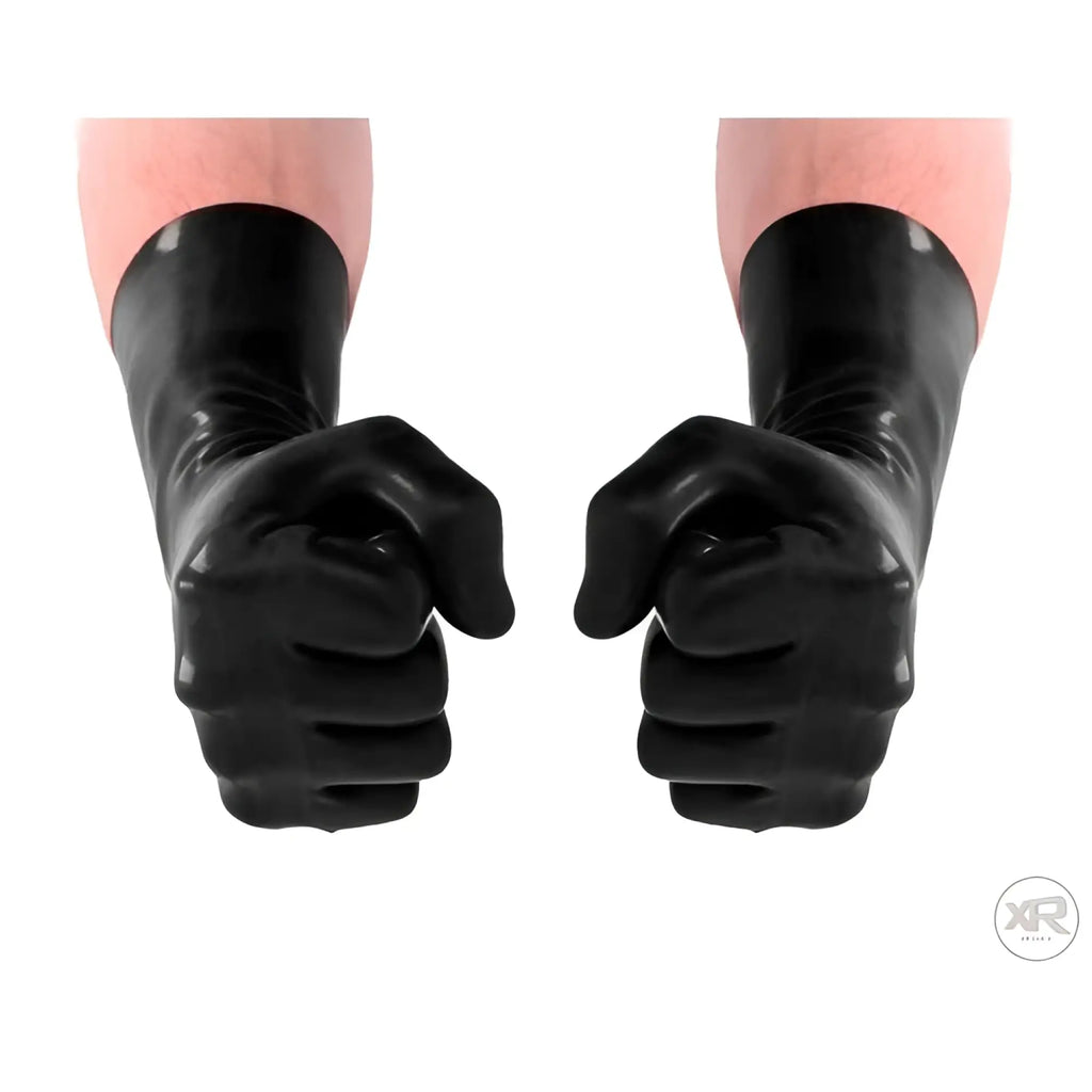 Shots FistIt black latex gloves worn on two clenched fists against a white background.