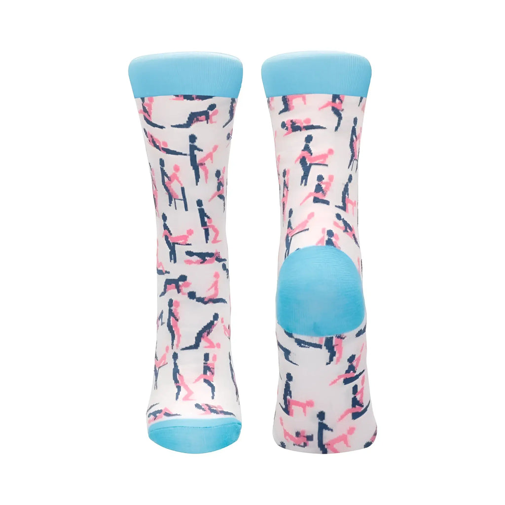 A pair of shots socks sutra socks s m white cotton socks with pink and black playful silhouettes and light blue accents