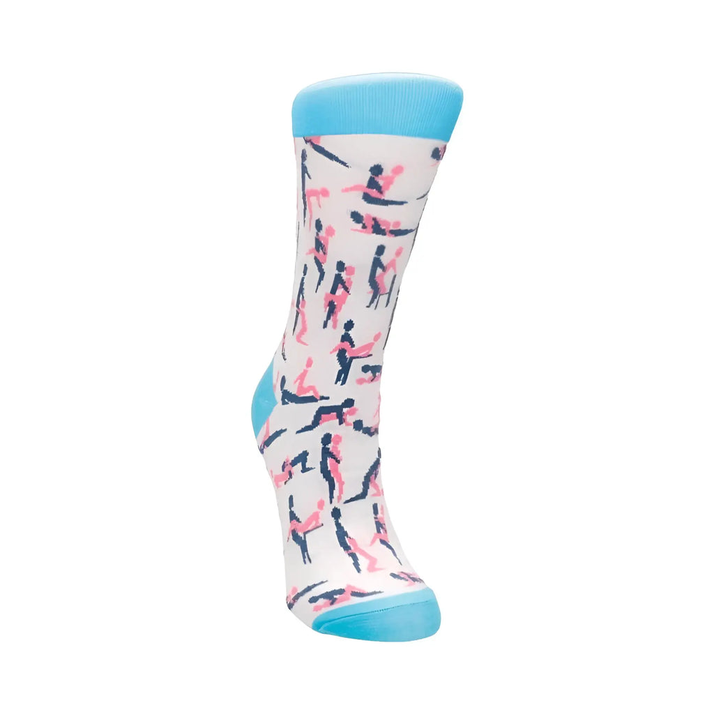 A playful white shots socks sutra sock s m with pink and navy blue silhouettes and light blue trim on top toe and heel
