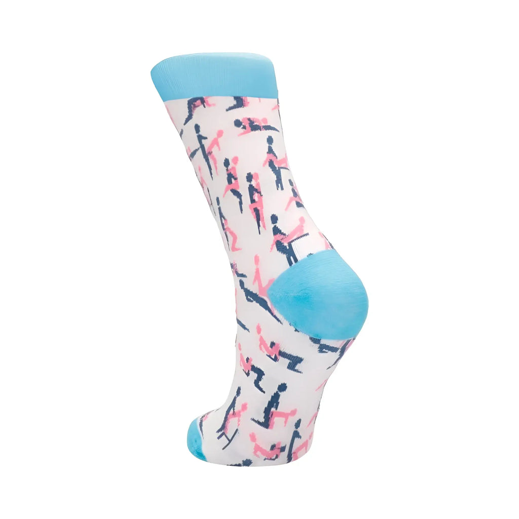 A playful white shots sutra sock sm with pink and navy blue silhouettes and light blue trim at cuff heel and toe