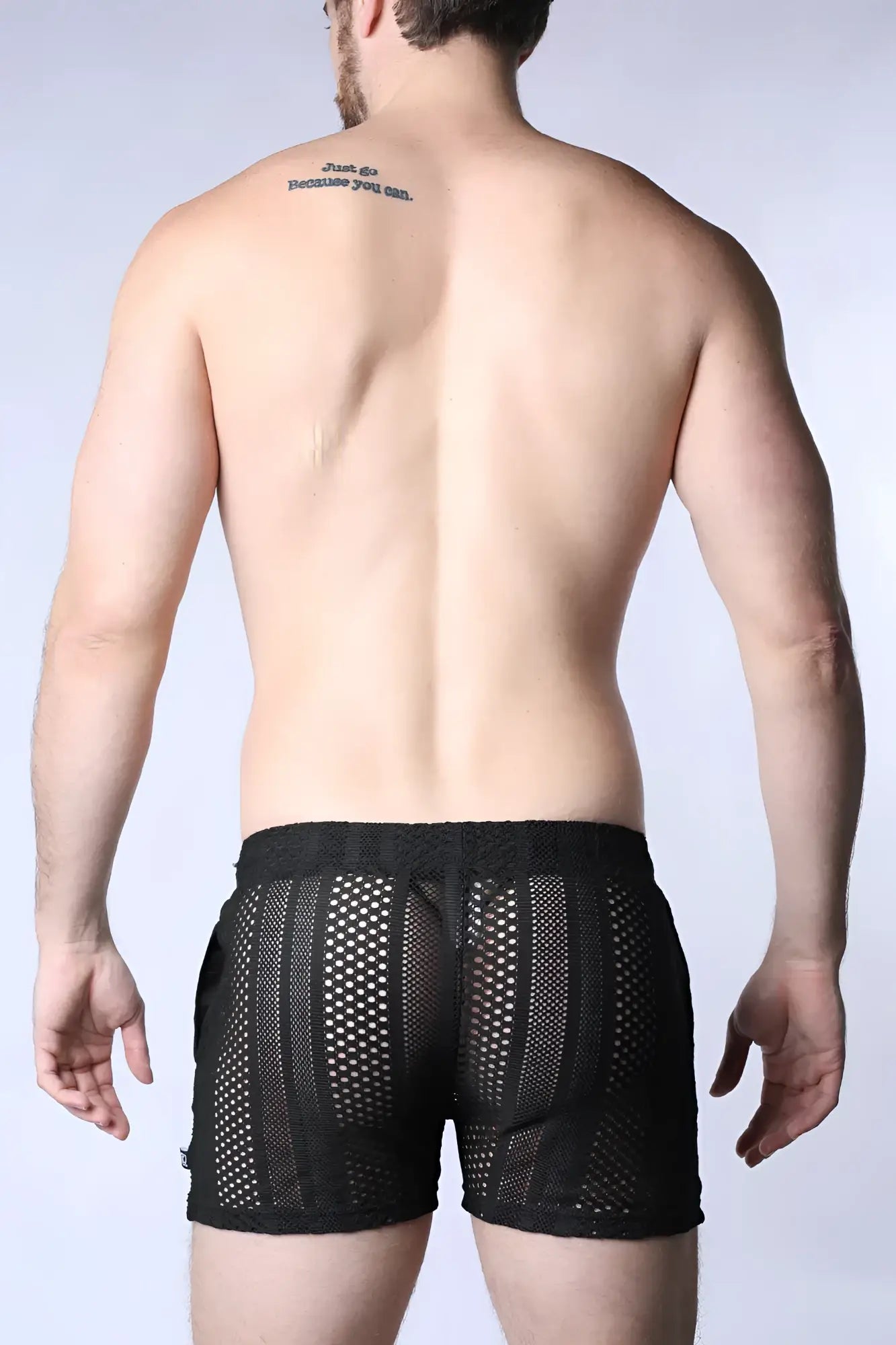 Black mesh sicily crochet mesh shorts feature a sleek modern design with reinforced side panels for durability