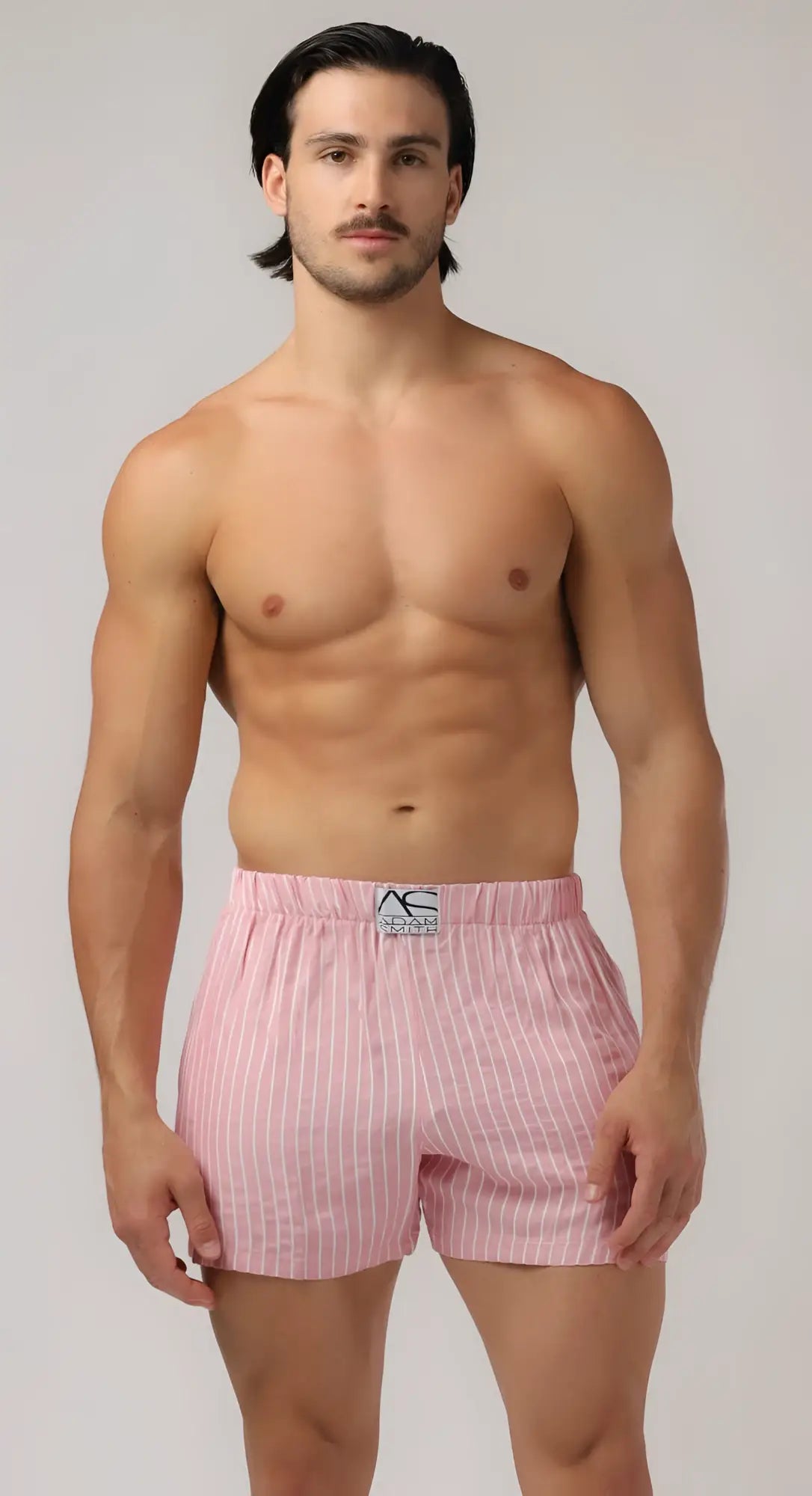 Side pocket relax boxers pink pinstripe boxer shorts with subtle elastic waistband and small logo patch