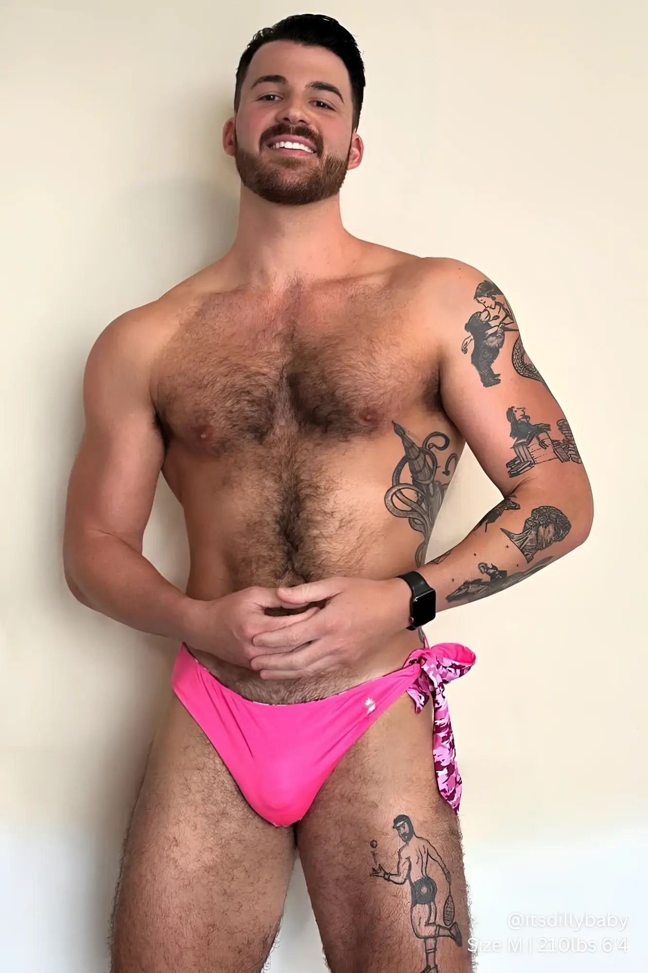 Bright pink reversible side-tie swim briefs with patterned fabric and tied side detail for beachwear use