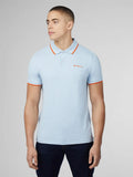 Light blue signature polo short-sleeved shirt with orange trim and small embroidered chest logo for casual wear