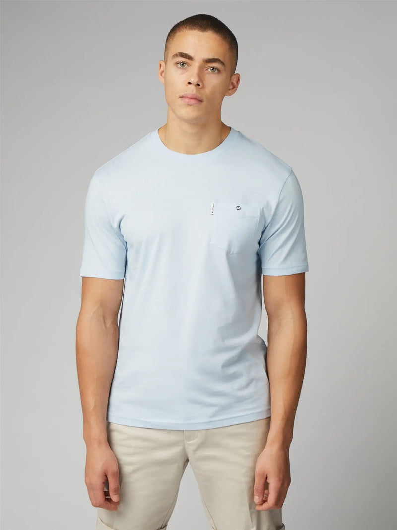 Light blue signature crewneck t-shirt with chest pocket and subtle logo perfect for casual everyday wear