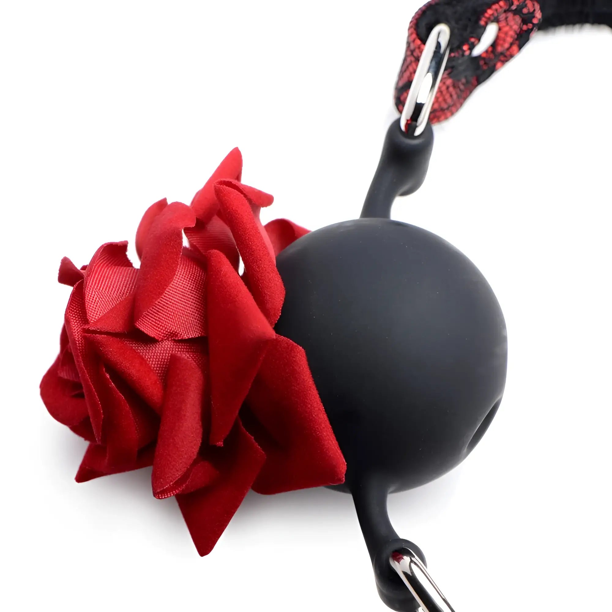 Black silicone ball gag with a red fabric rose on the side and an adjustable black strap for secure fit