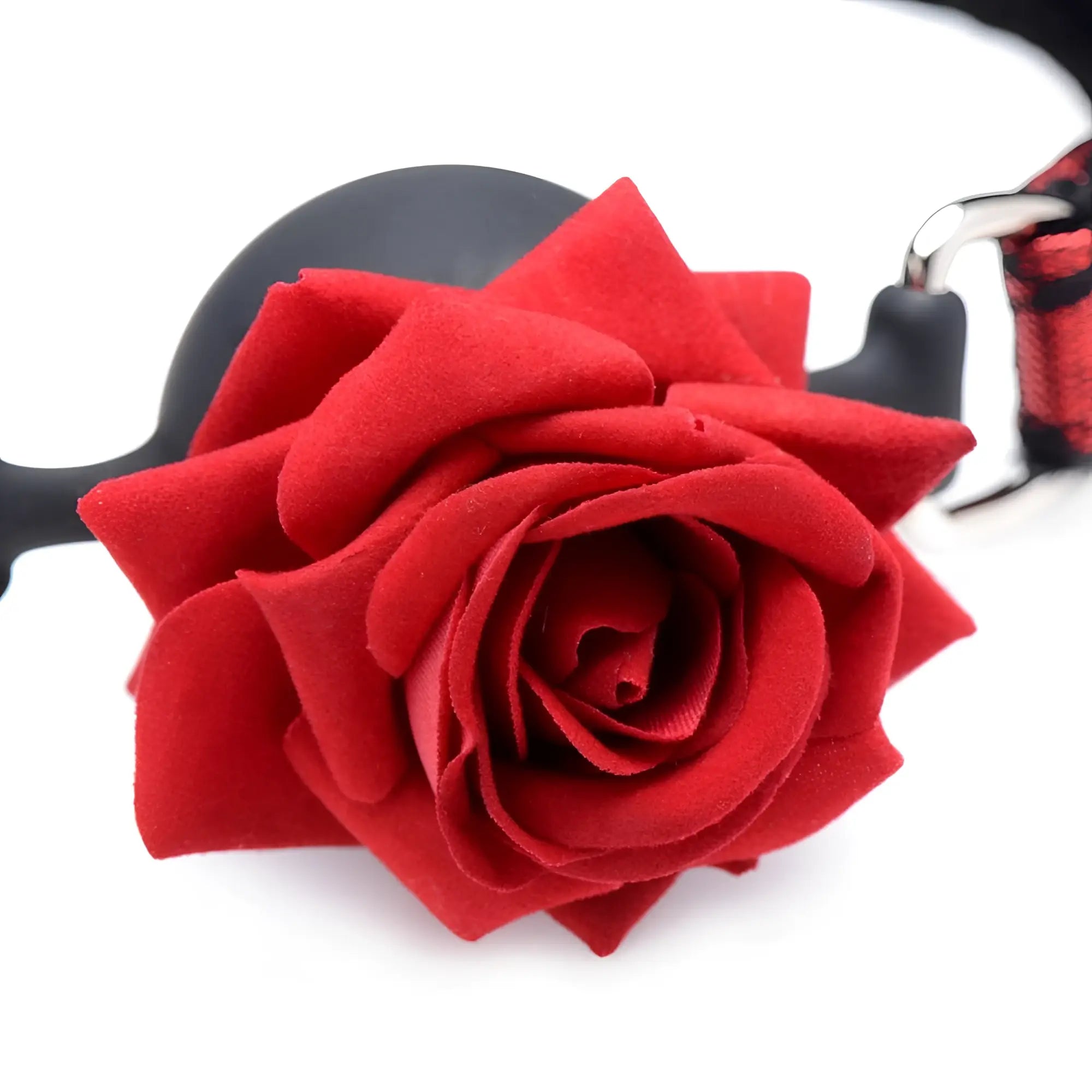 A plush red rose-shaped silicone anal plug with a black handle and metallic attachment for intimate use