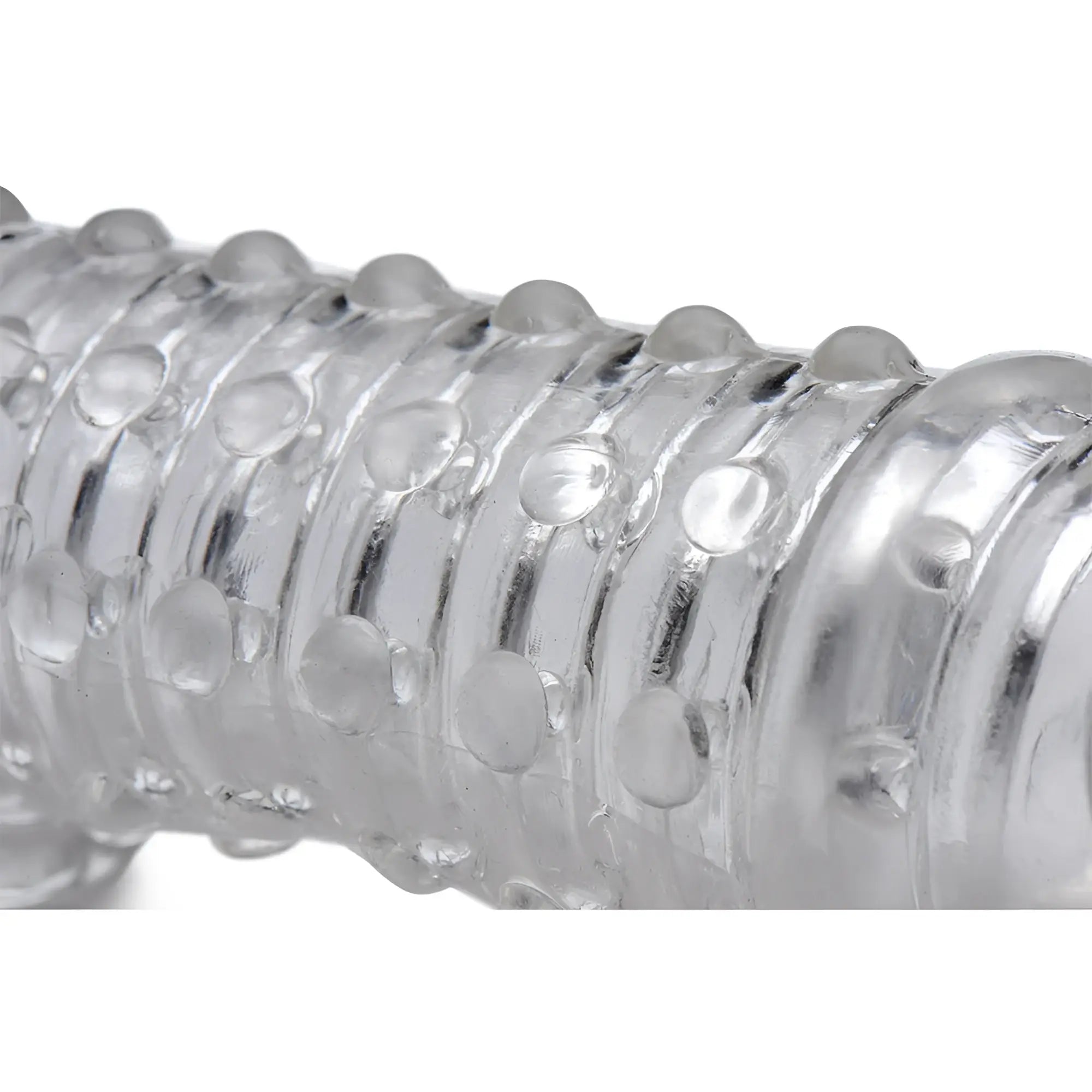 Clear Size Matters 1.5 Inch Penis Enhancer Sleeve featuring a ribbed, textured surface with raised bumps.