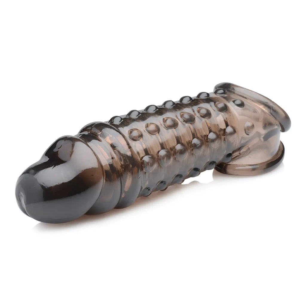 Size Matters 1.5 Inch translucent black textured penis enhancer sleeve with raised nodules on a white background.