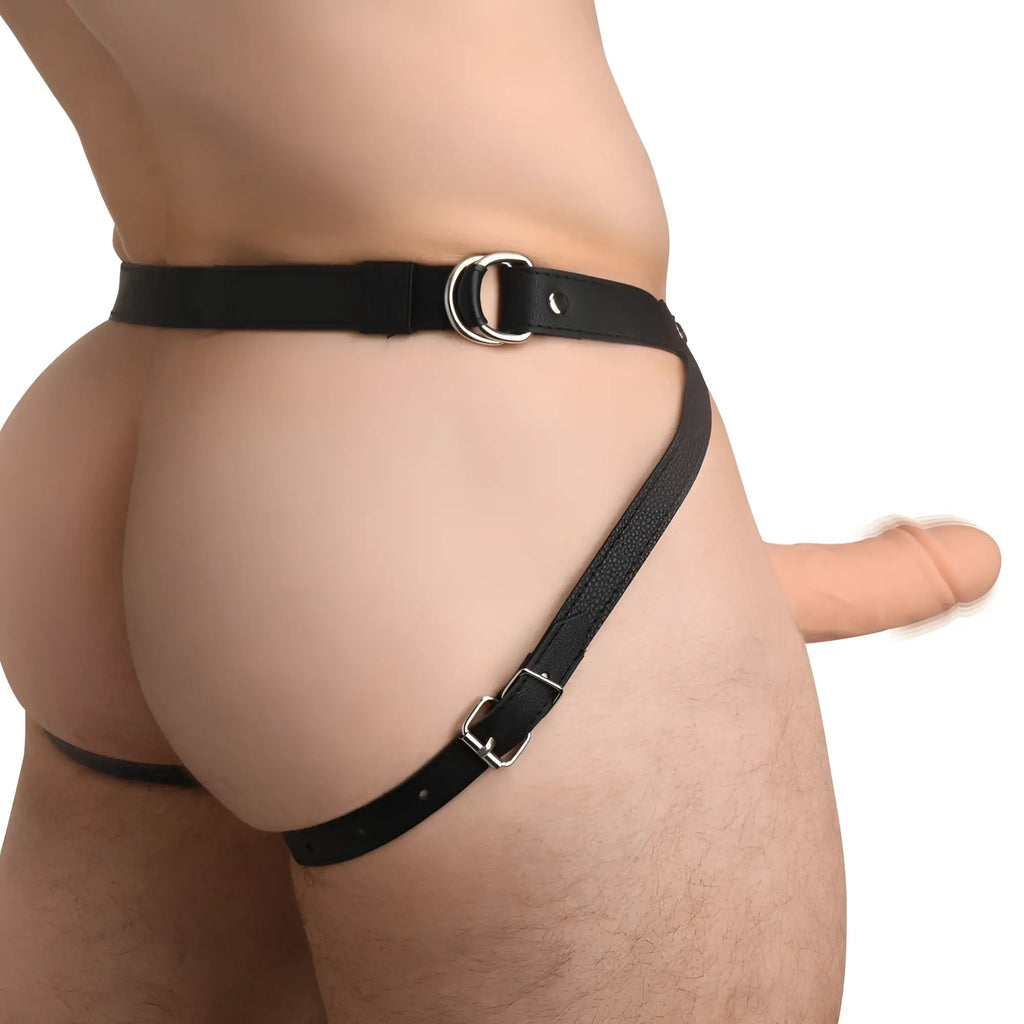 Size Matters realistic silicone penis sheath worn with a black buckled harness, shown from a side perspective.
