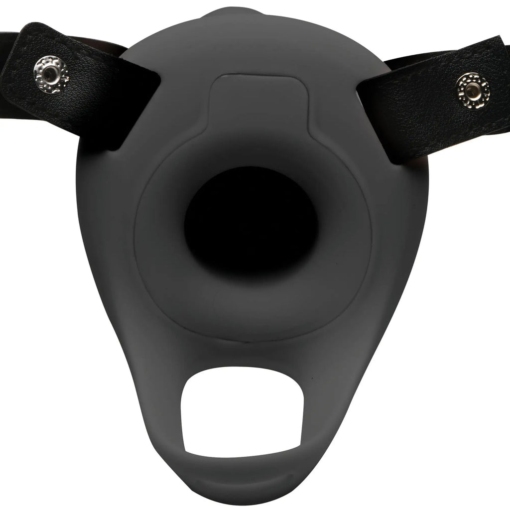 Size Matters vibrating silicone penis sheath in grey, featuring a smooth design with black adjustable leather straps.