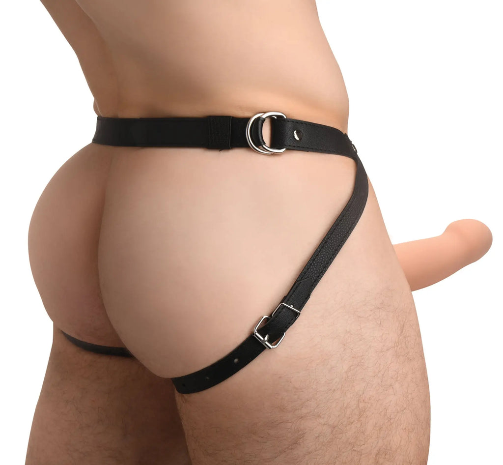 Size Matters 2-inch smooth silicone penis sheath in a black leather-style harness with silver metal buckles.