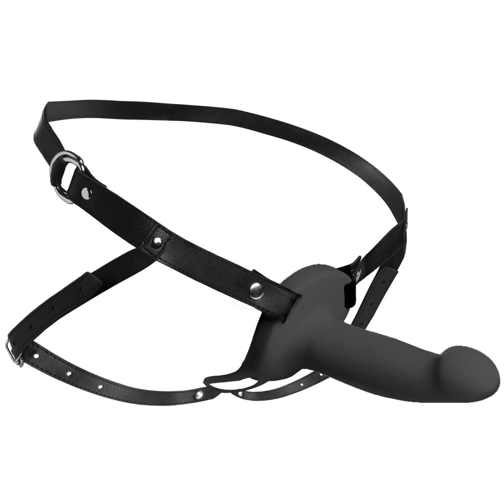 Size Matters 2 Inch Erection Smooth Silicone Penis Sheath attached to a black adjustable harness with metal studs.