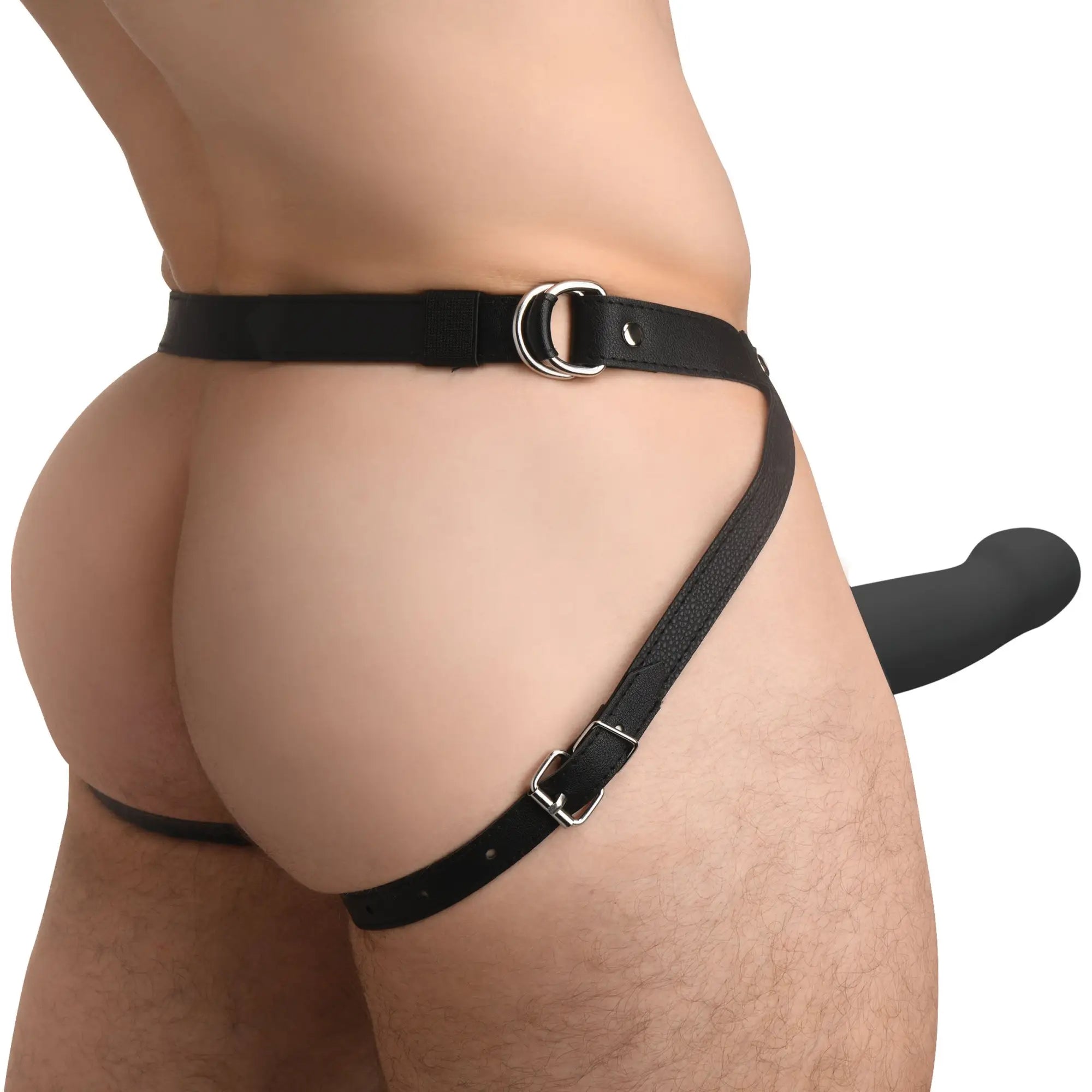 Size Matters 2 Inch smooth silicone penis sheath in black, worn with a black leather-look adjustable harness.