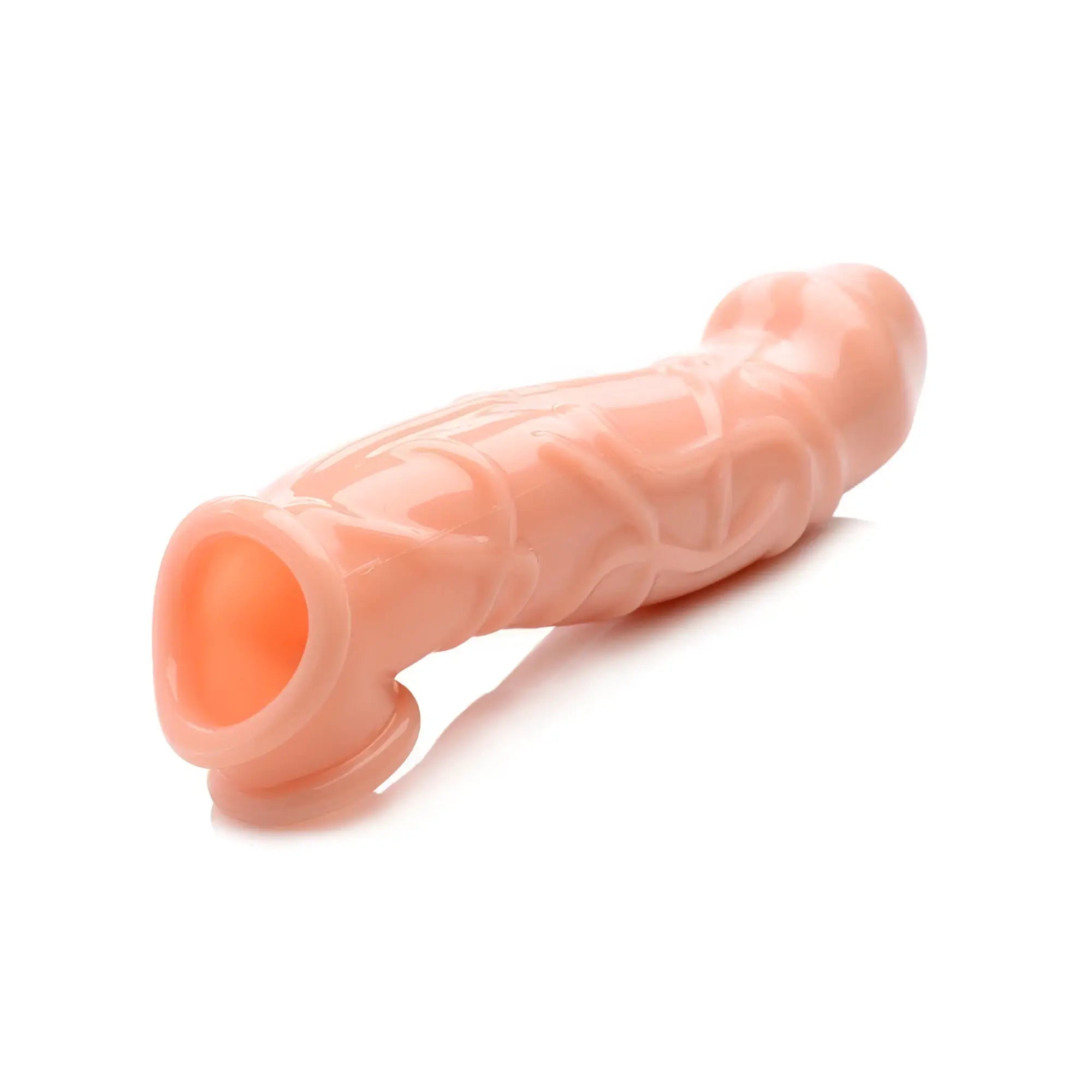 Size Matters 2 Inch Flesh Extender Sleeve: a light-toned, textured, hollow silicone enhancement sleeve.