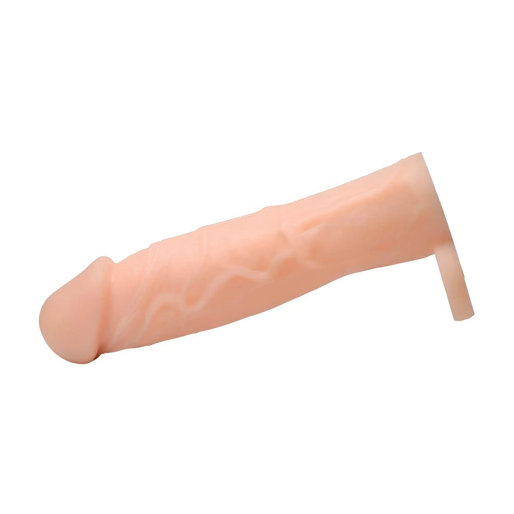Size Matters 2-inch silicone penis extension in light flesh tone with realistic skin texture and vein detailing.