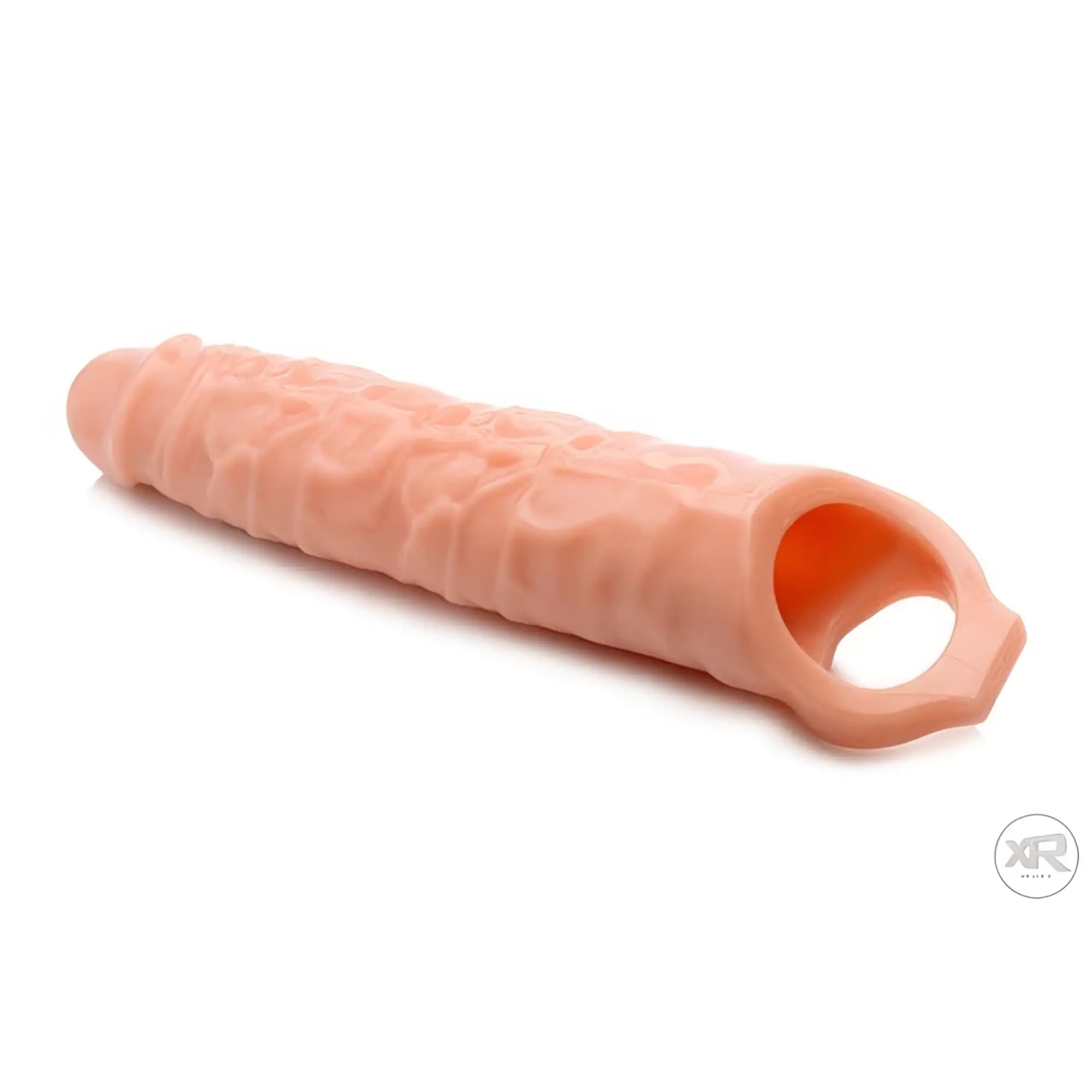 Size Matters 3-inch extender sleeve in flesh tone with a textured, phallic design and open ring base.