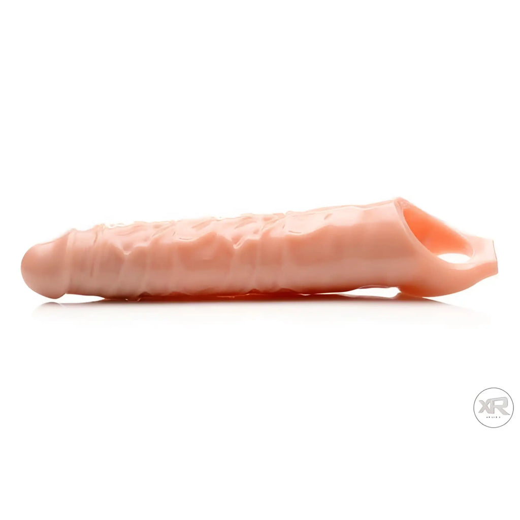Size Matters 3-inch extender sleeve in flesh color, featuring a textured, realistic design on a plain white background.
