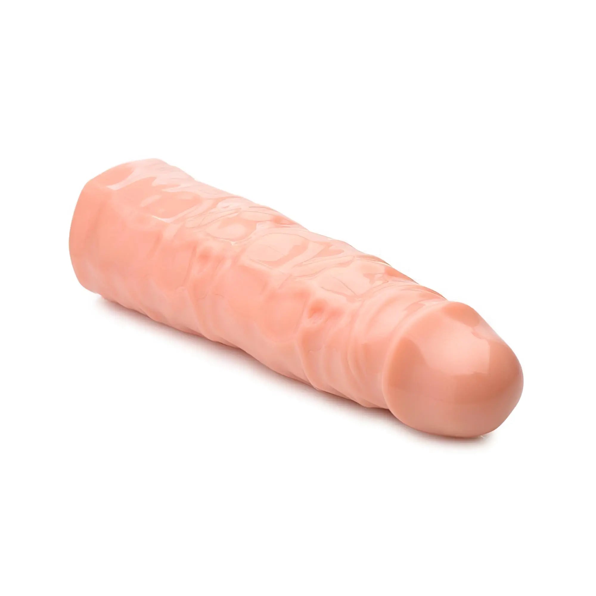 Size Matters 3-inch flesh-colored penis enhancer sleeve featuring a realistic, textured shaft and rounded tip.