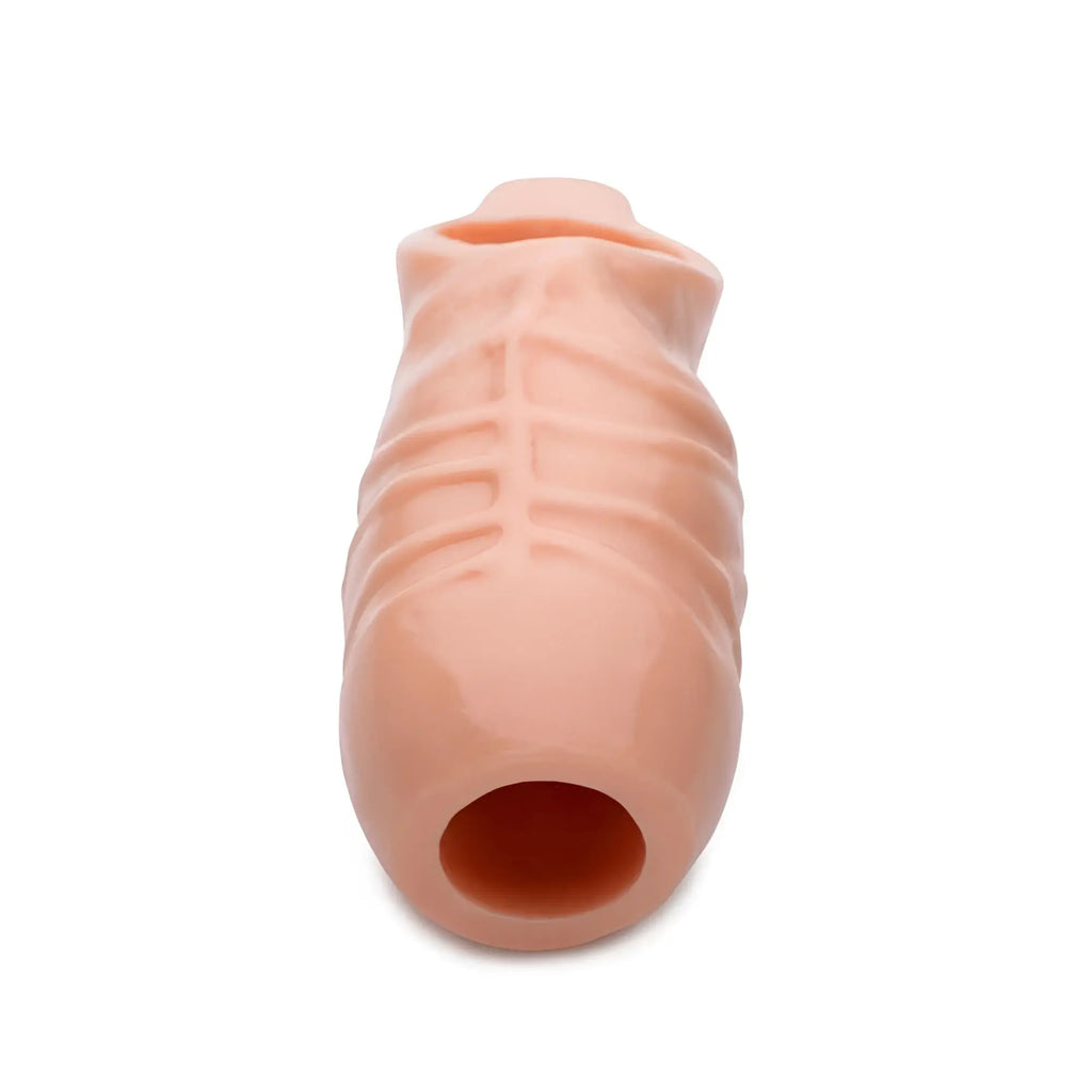 Size Matters 5 Inch Open Tip Penis Extension: a flesh-toned, textured silicone sleeve with a rounded, open end.